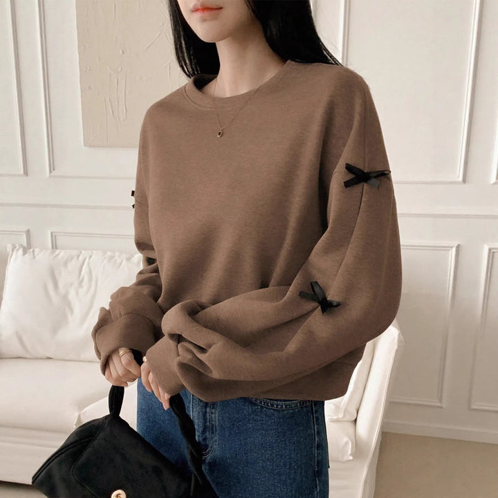 Women’s Oversize Sweatshirt with Decorative Bow Sleeves and Round Neckline Mune Fashion