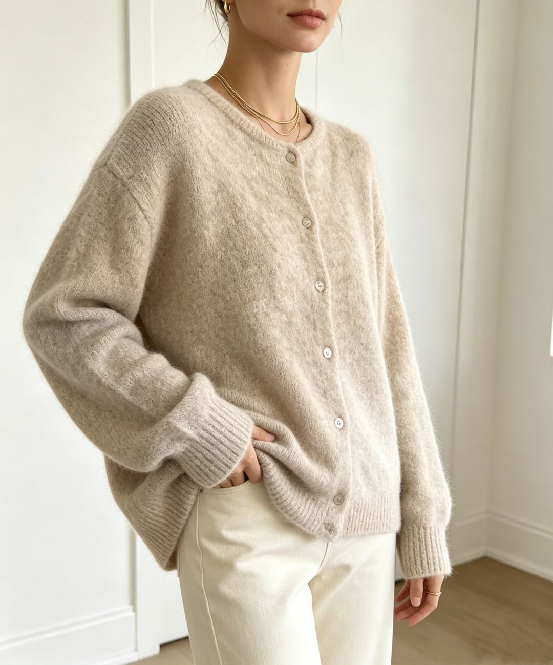Ladies round neck cardigan with soft flormix, button closure and ribbed cuffs Mune Fashion