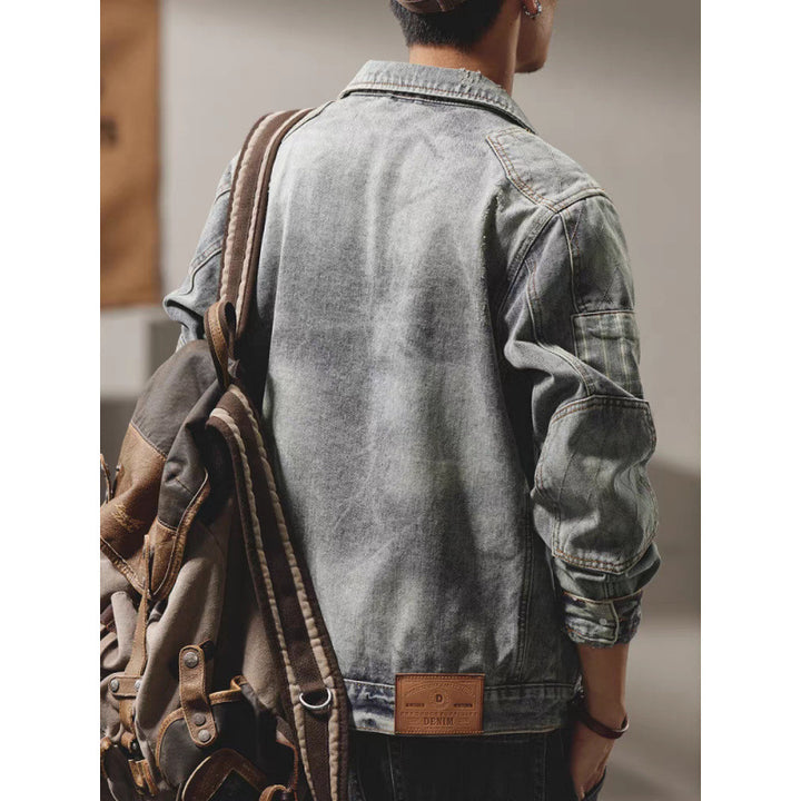 Men's denim jacket in a used look with shirt collar, flap chest pockets, and relaxed fit Mune Fashion