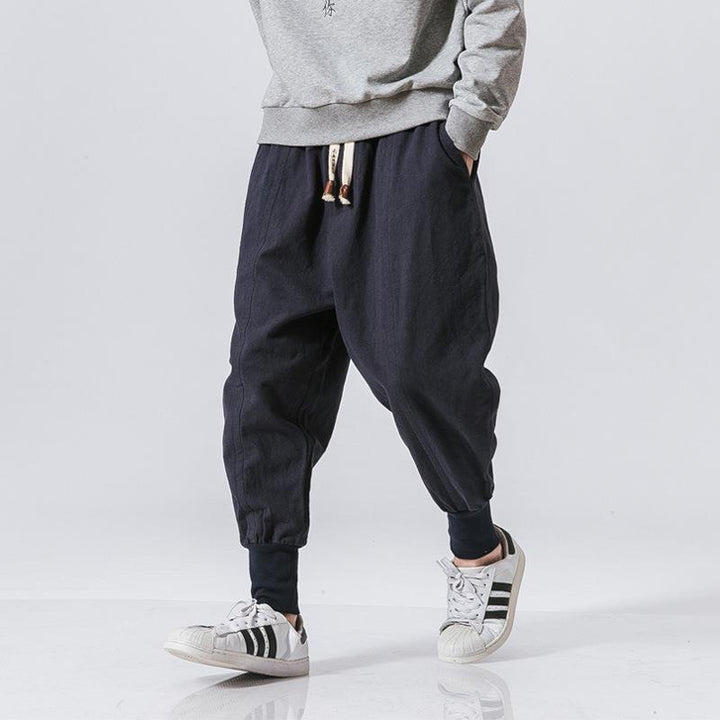 Men's wide harem pants with elastic waistband, drawstring, deep crotch, and ribbed cuffs Mune Fashion