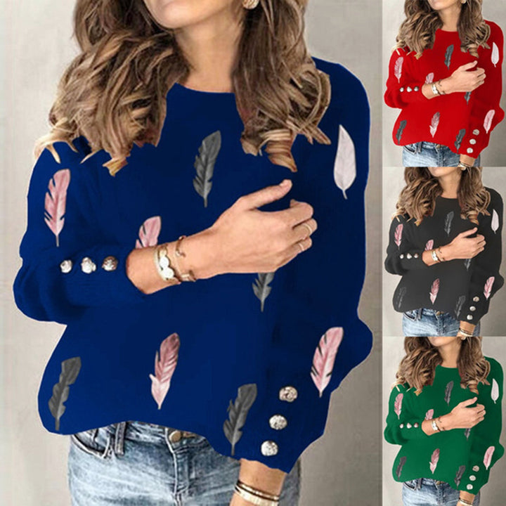 Women's fine knit sweater with feather motif, round neck and decorative button placket Mune Fashion