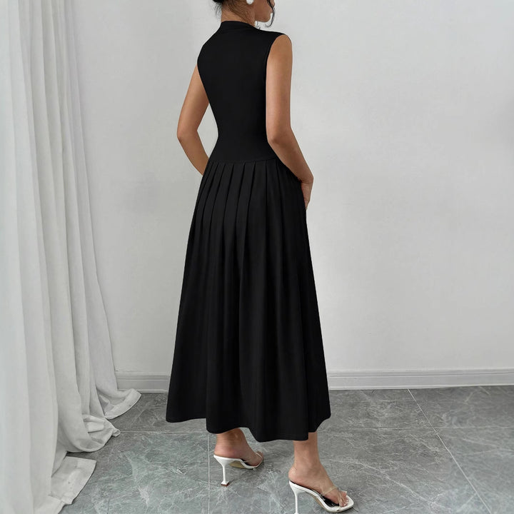 Women's sleeveless maxi dress with high standing collar, fitted bodice, and pleated skirt Mune Fashion