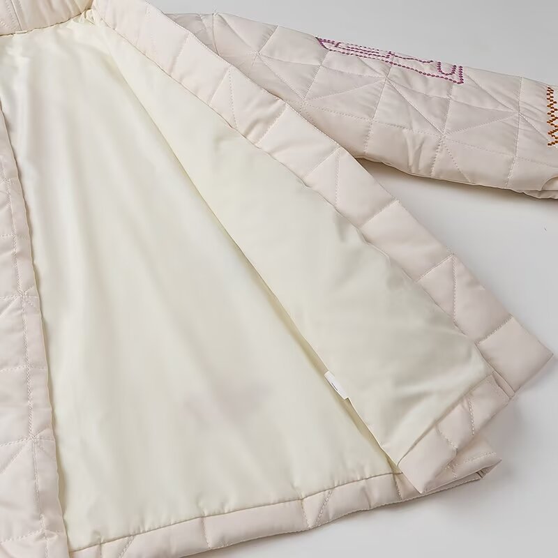 Women's padded kimono jacket with decorative embroidery, open front and patch pockets Mune Fashion