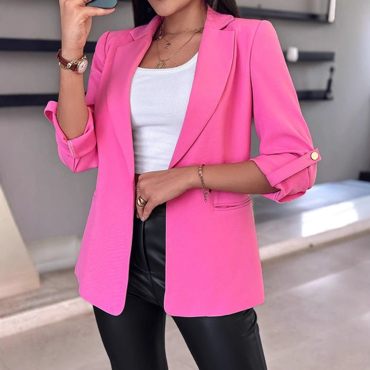 Women's tailored long blazer with lapel, rolled-up sleeves, and hidden side pockets Mune Fashion