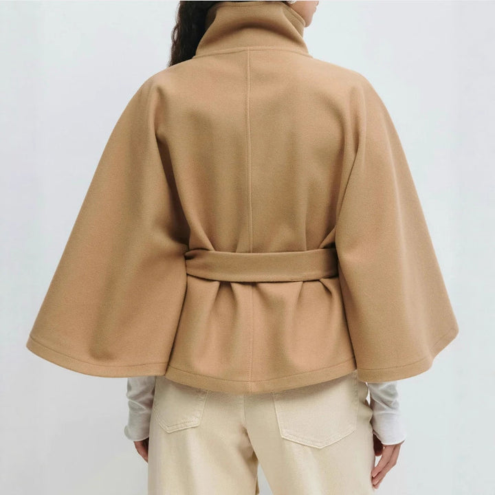 Ladies oversized cape jacket with stand-up collar, concealed button placket and belt Mune Fashion