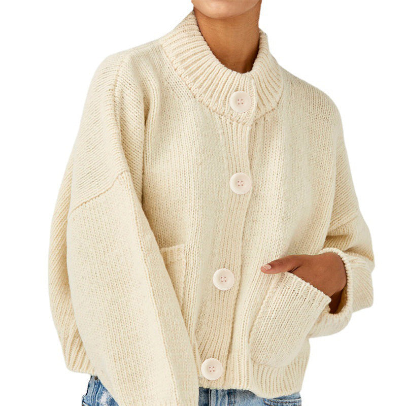 Women's Short Boxy Cardigan made of chunky knit with high button placket and side pockets Mune Fashion