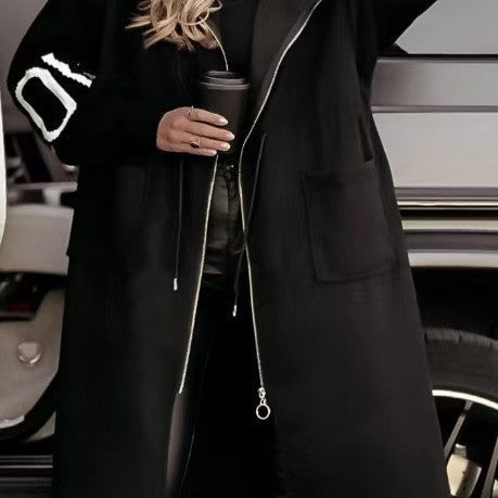 Women’s hooded coat with oversized cut, knitted sleeve cuffs and patch pockets Mune Fashion