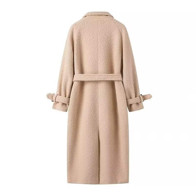 Women long cut bouclé teddy coat in oversized cut with double button front and adjustable sleeve straps Mune Fashion