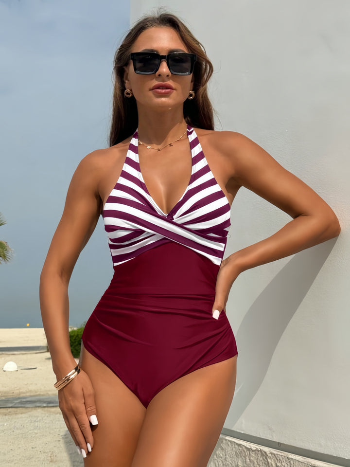 Women's one-piece swimsuit with elegant wrap design and vertical stripes Mune Fashion