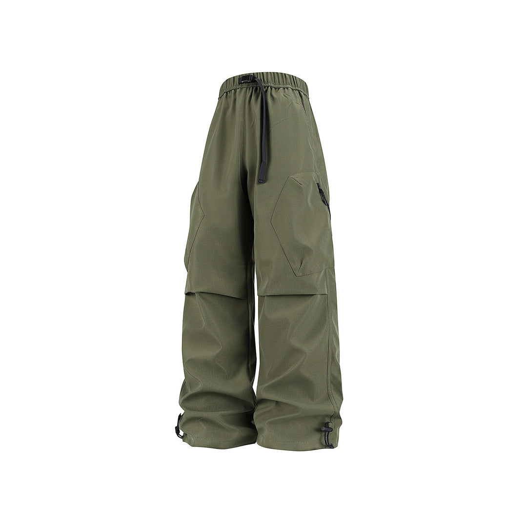 Men's wide cargo pants in baggy style with drawstring waistband, large flap pockets, and adjustable leg openings Drune