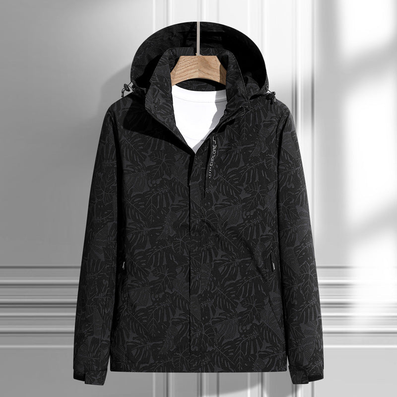 Women's lightweight packable rain and wind jacket with hood, leaf pattern and concealed zippers Mune Fashion