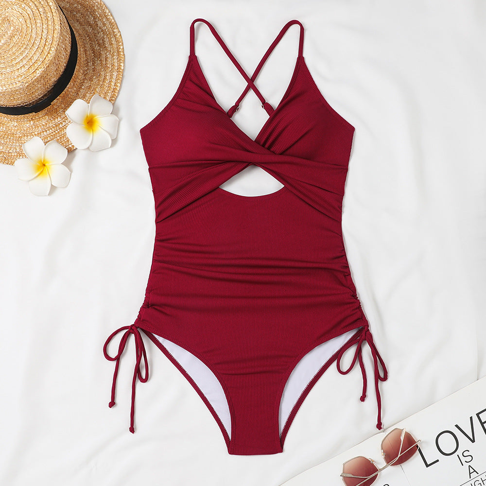 Women's one-piece swimsuit with sophisticated wrap design and trendy cut-out Mune Fashion