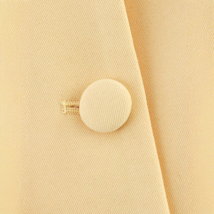 Women tailored round neck blazer jacket with concealed button placket, flap pockets and figure-enhancing seam lines Mune Fashion