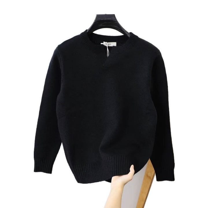 Unisex fine knit sweater with round neck and neck tab in oversized cut Mune Fashion