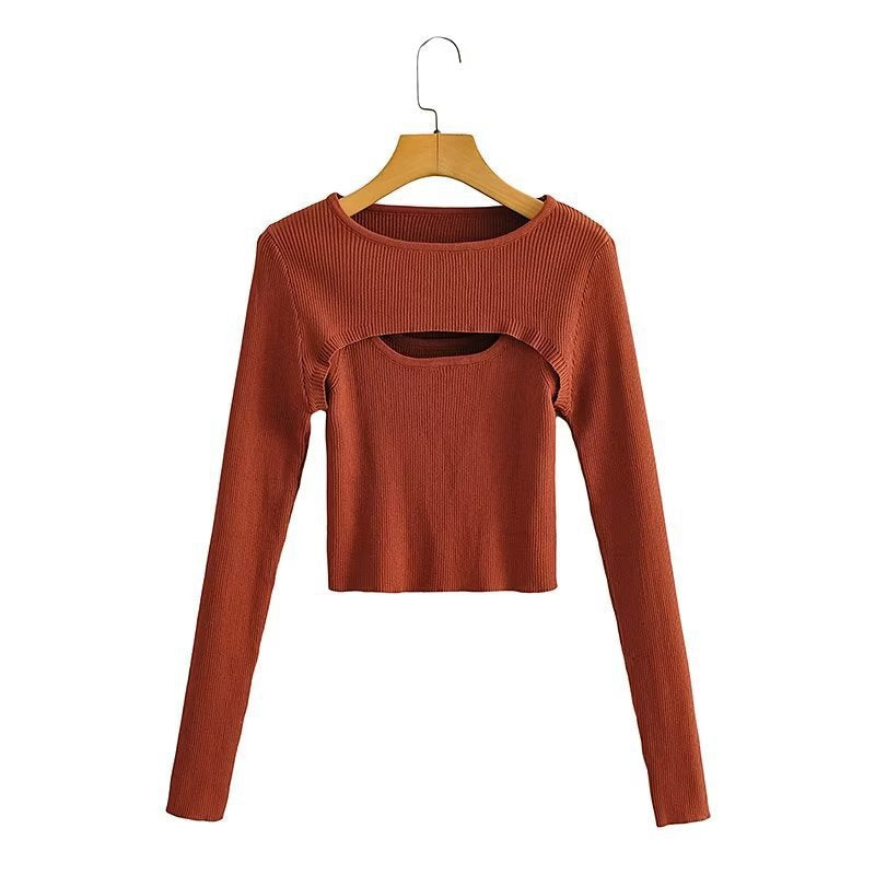 Women short cut ribbed knit top with asymmetric cut-outs and round neckline Mune Fashion