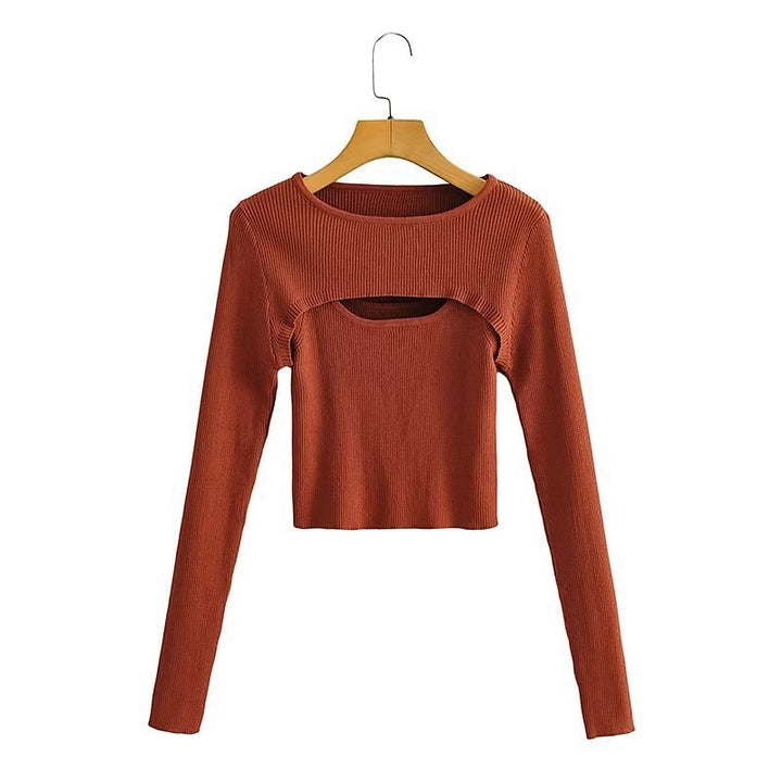 Women short cut ribbed knit top with asymmetric cut-outs and round neckline Mune Fashion