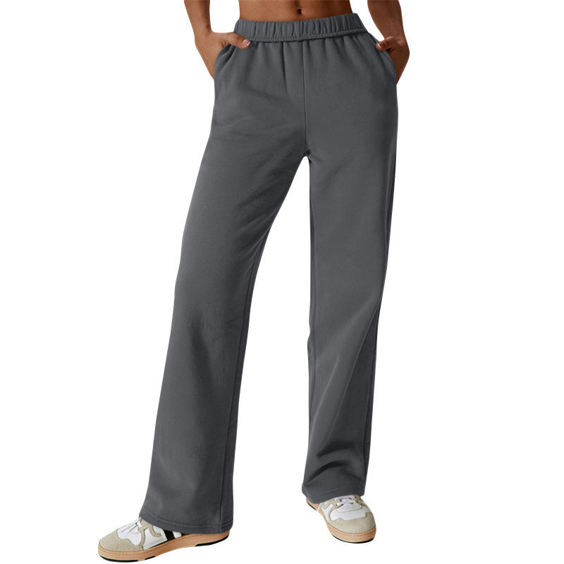 Women high-waisted flared lounge pants with elastic comfort waistband and concealed pockets Mune Fashion