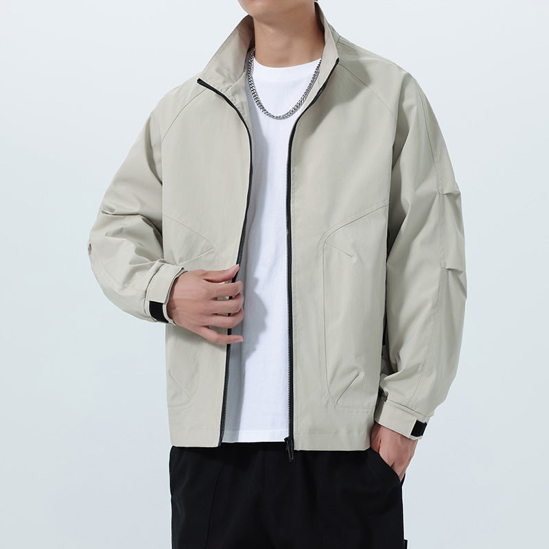 Men's Lightweight Utility Transitional Jacket with Stand Collar, Raglan Sleeves, and Adjustable Velcro Cuffs Mune Fashion