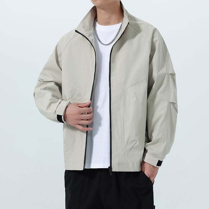 Men's Lightweight Utility Transitional Jacket with Stand Collar, Raglan Sleeves, and Adjustable Velcro Cuffs Mune Fashion