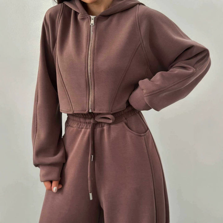 Women's loose high-waist lounge pants with drawstring, side pockets, and decorative seams Mune Fashion