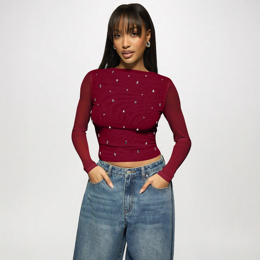 Women's fitted mesh top with rhinestone applications and boat neck Mune Fashion