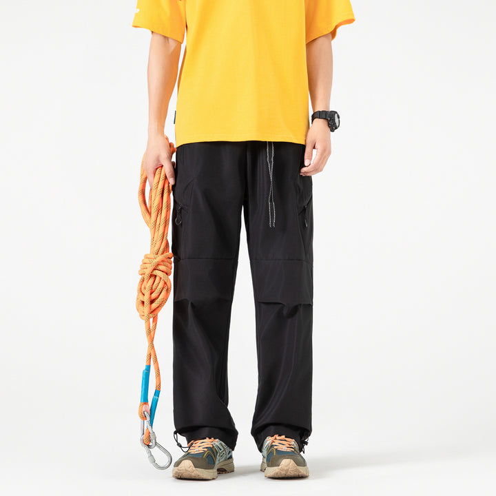 Damen Weite Utility-Cargo-Hose mit Tunnelzugbund, Reißverschluss-Taschen und verstellbaren Beinabschlüssen Mune Fashion