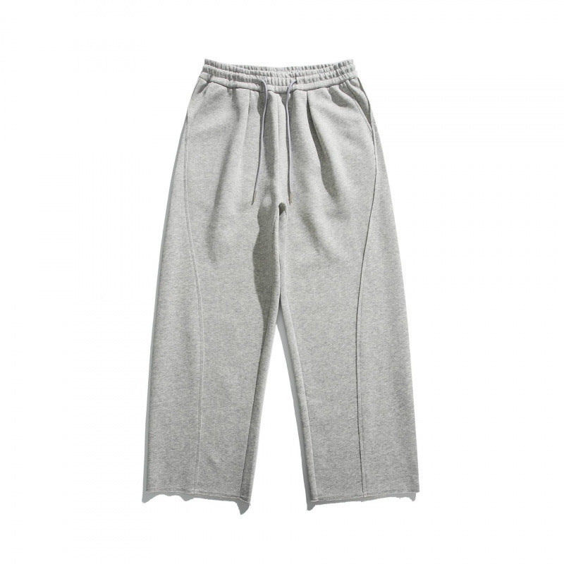 Unisex Loose Cotton Fleece Jogging Pants with Drawstring, Decorative Front Seams and Raw Hem Mune Fashion