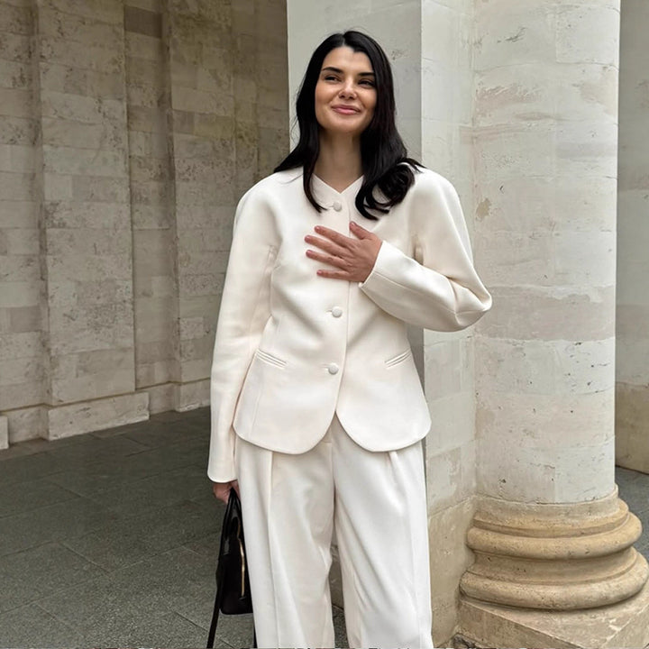 Women Short Blazer with Sculptural Shoulder, Rounded Neckline and Concealed Button Placket Mune Fashion