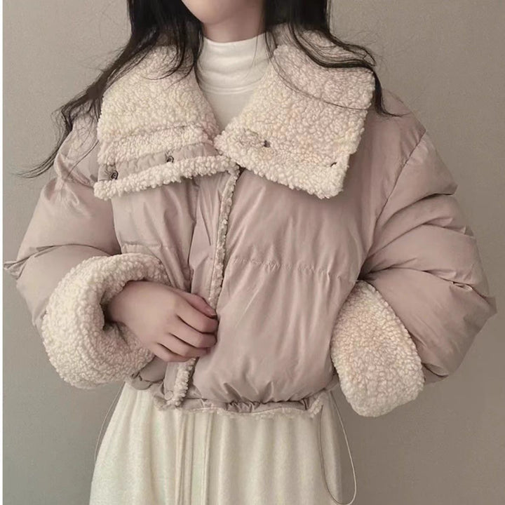 Women's short quilted puffer jacket with teddy collar, roll-up sleeves, and drawstring hem Mune Fashion