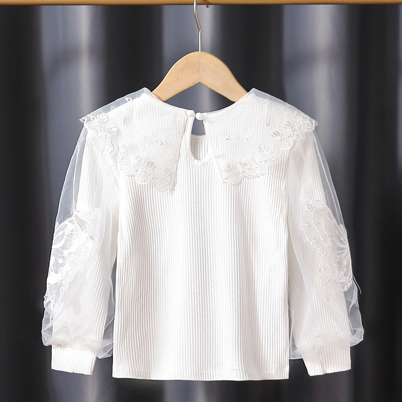 Girl's blouse with transparent puff sleeves and floral lace trim Mune Fashion