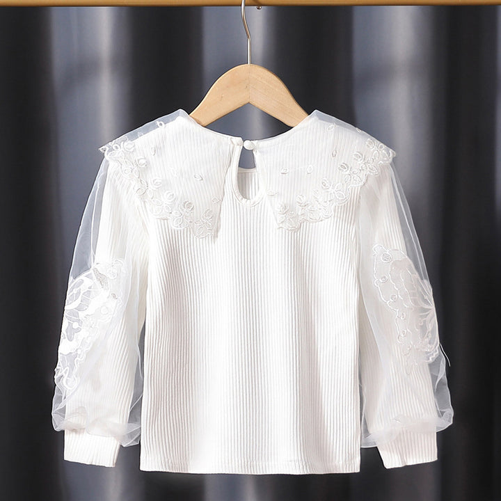 Girl's blouse with transparent puff sleeves and floral lace trim Mune Fashion