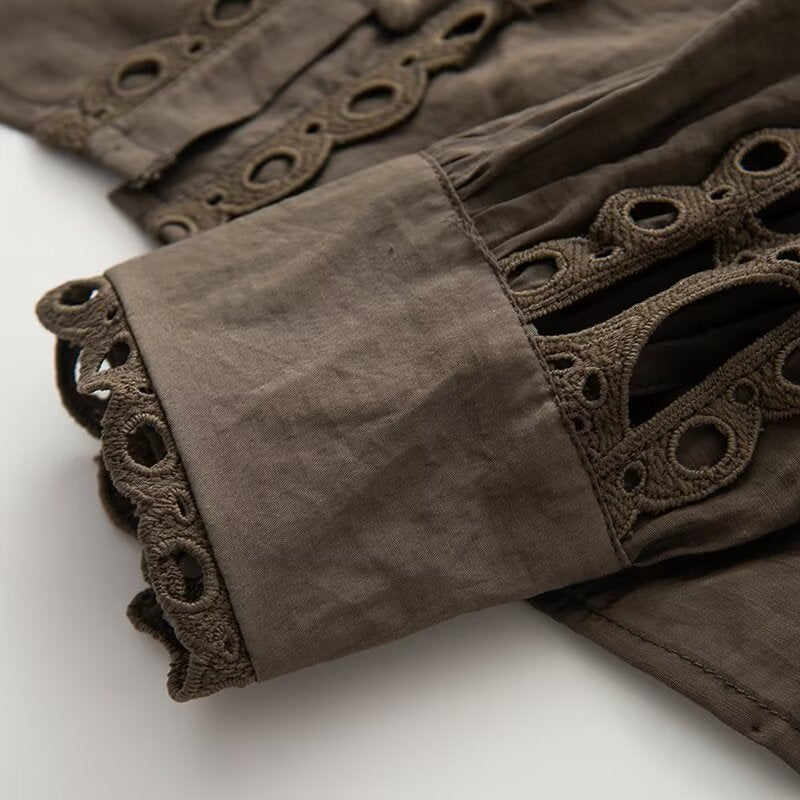Ladies blouse with lace cutouts, fine button placket and balloon sleeves Mune Fashion