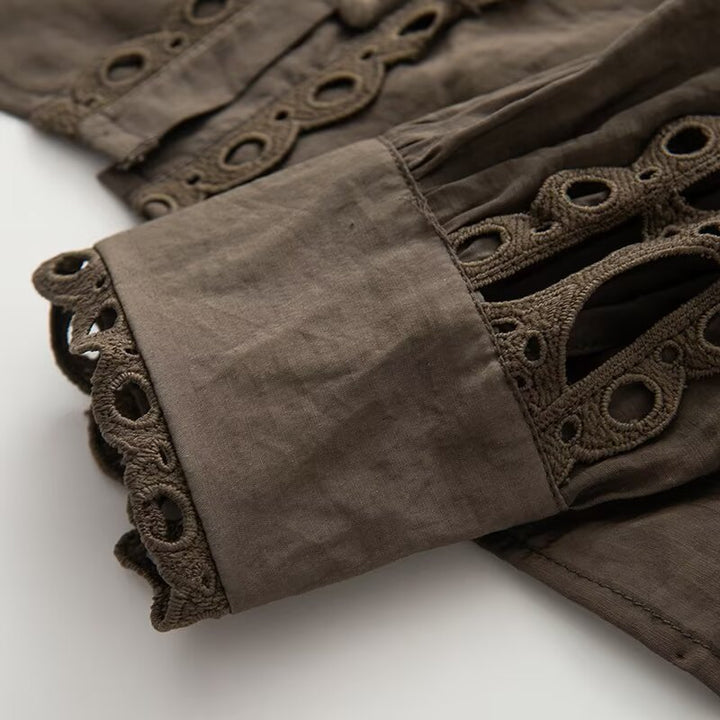 Ladies blouse with lace cutouts, fine button placket and balloon sleeves Mune Fashion