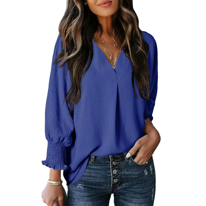 Women V-neck blouse with casual balloon sleeves and ruffle details Mune Fashion