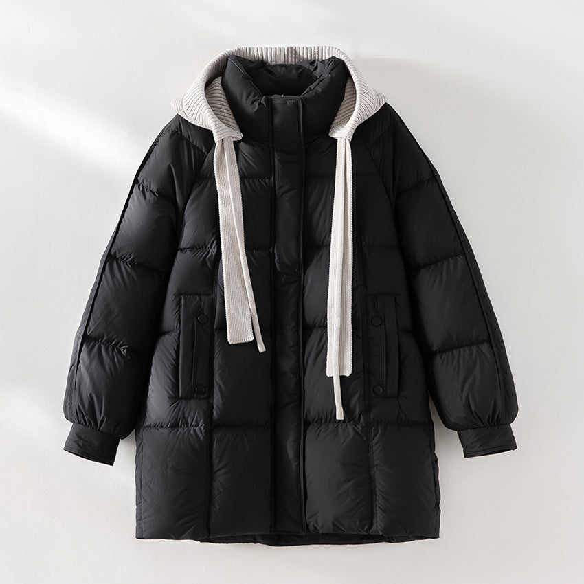 Women's padded quilted jacket with hood ribbed collar loose fit and midi length Mune Fashion