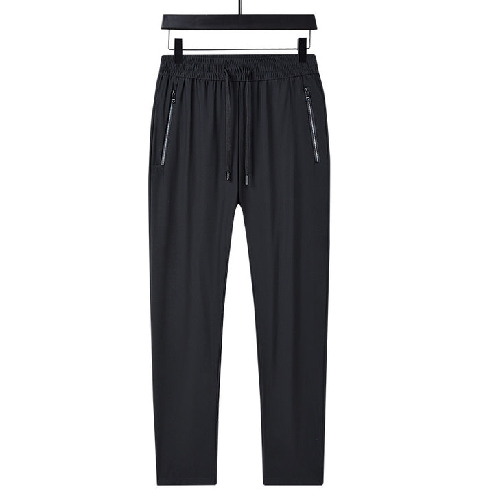 Men's sporty training pants with functional zippered pockets Mune Fashion