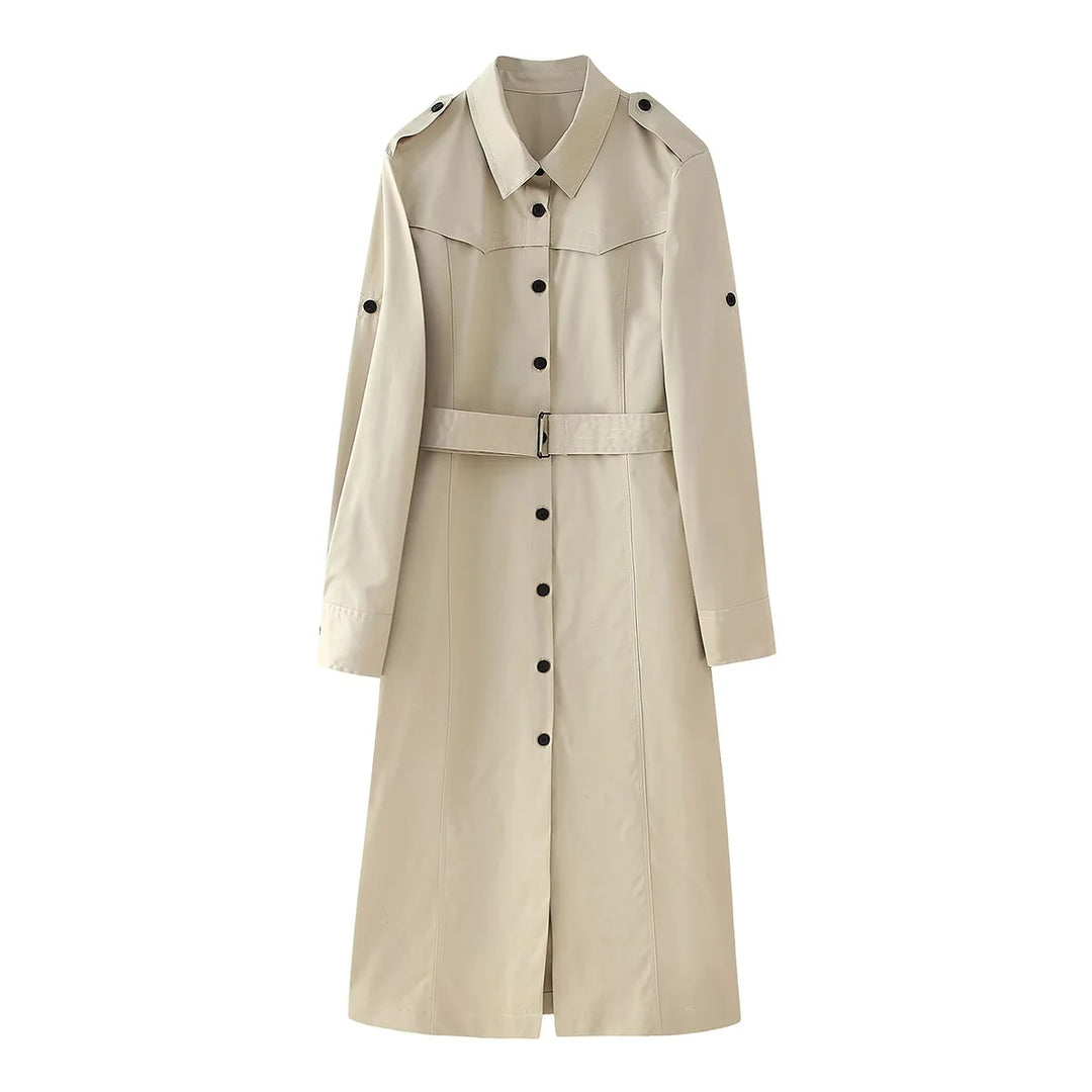 Women's longer tailored trench coat with waist belt, shoulder epaulettes, and continuous button placket Mune Fashion