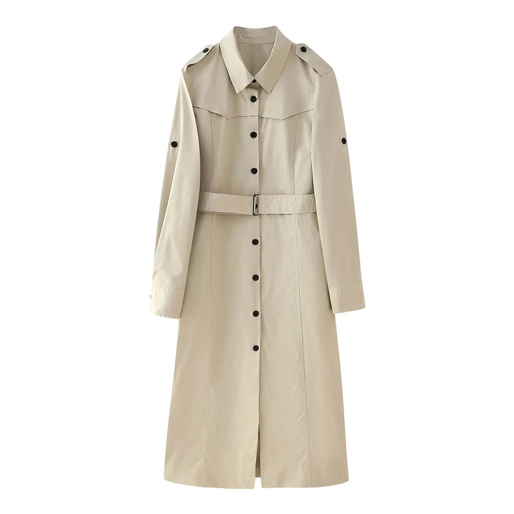Women's longer tailored trench coat with waist belt, shoulder epaulettes, and continuous button placket Mune Fashion