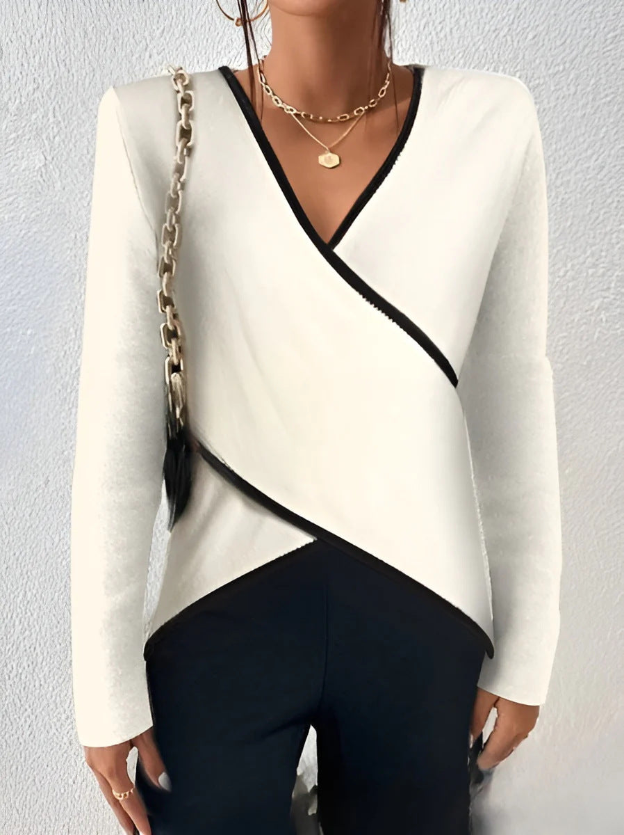 Women's wrap top with V-neckline, contrast piping, and asymmetric hem Mune Fashion