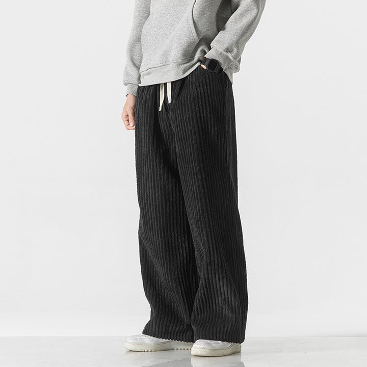 Men's loosely cut corduroy pants with drawstring waistband and distinctive ribbed texture Mune Fashion