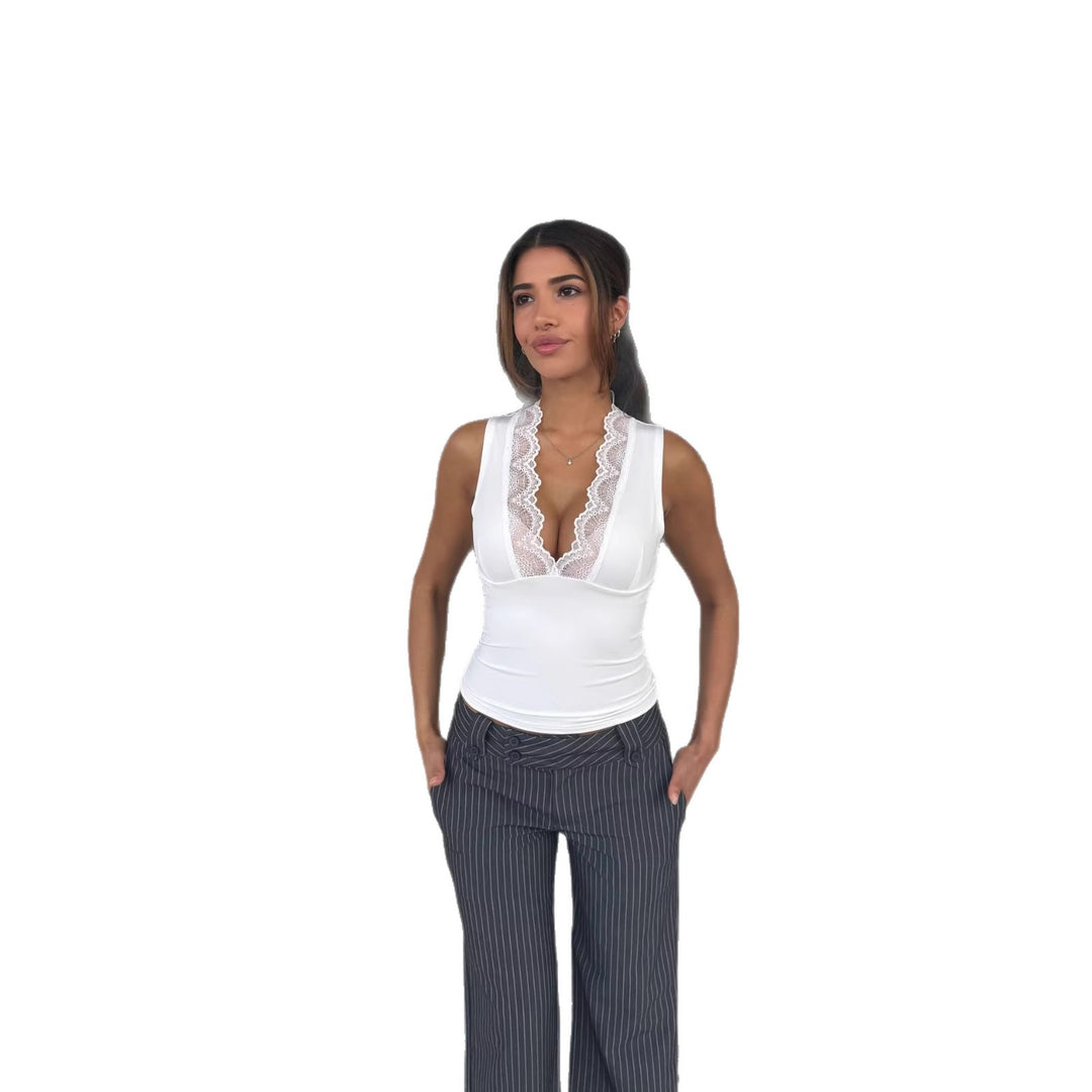 Women in tailored sleeveless top with deep V-neck and floral lace trim Mune Fashion