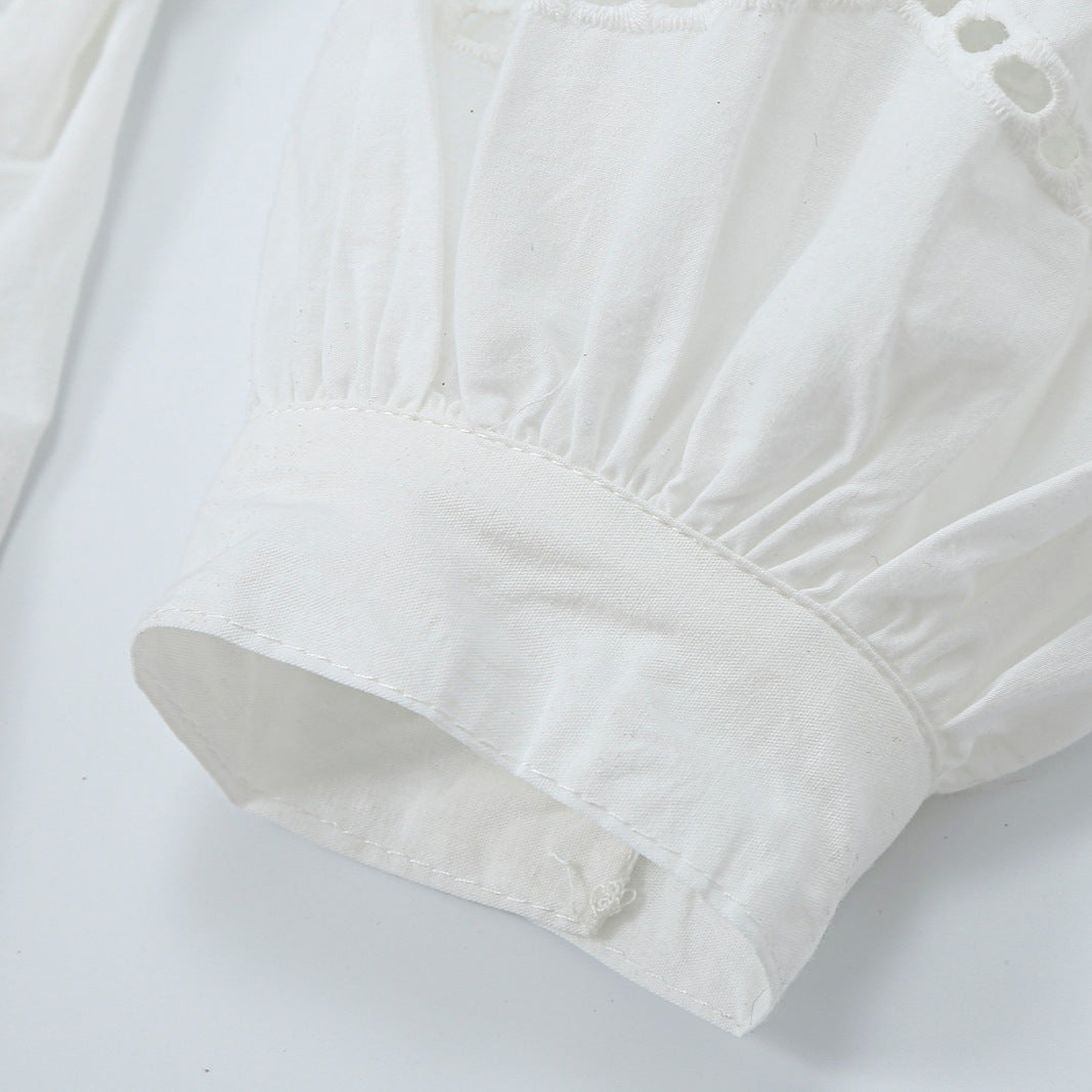 Women's blouse with V-neckline, broderie embroidery, and voluminous puff sleeves Mune Fashion