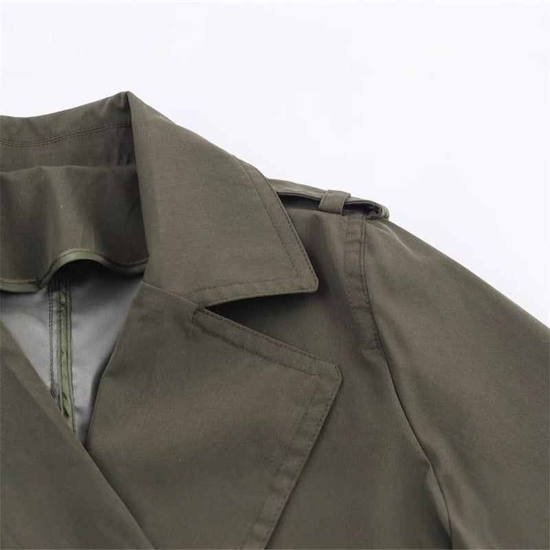Women's short trench coat with A-line silhouette, double-breasted button placket, detachable belt, and shoulder epaulettes Mune Fashion