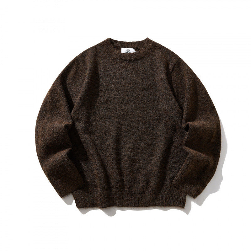 Unisex Oversize fine knit sweater with round neckline, ribbed cuffs, and mottled wool blend Mune Fashion