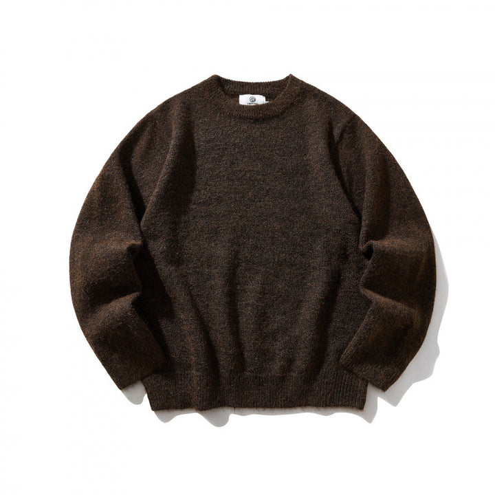 Unisex Oversize fine knit sweater with round neckline, ribbed cuffs, and mottled wool blend Mune Fashion