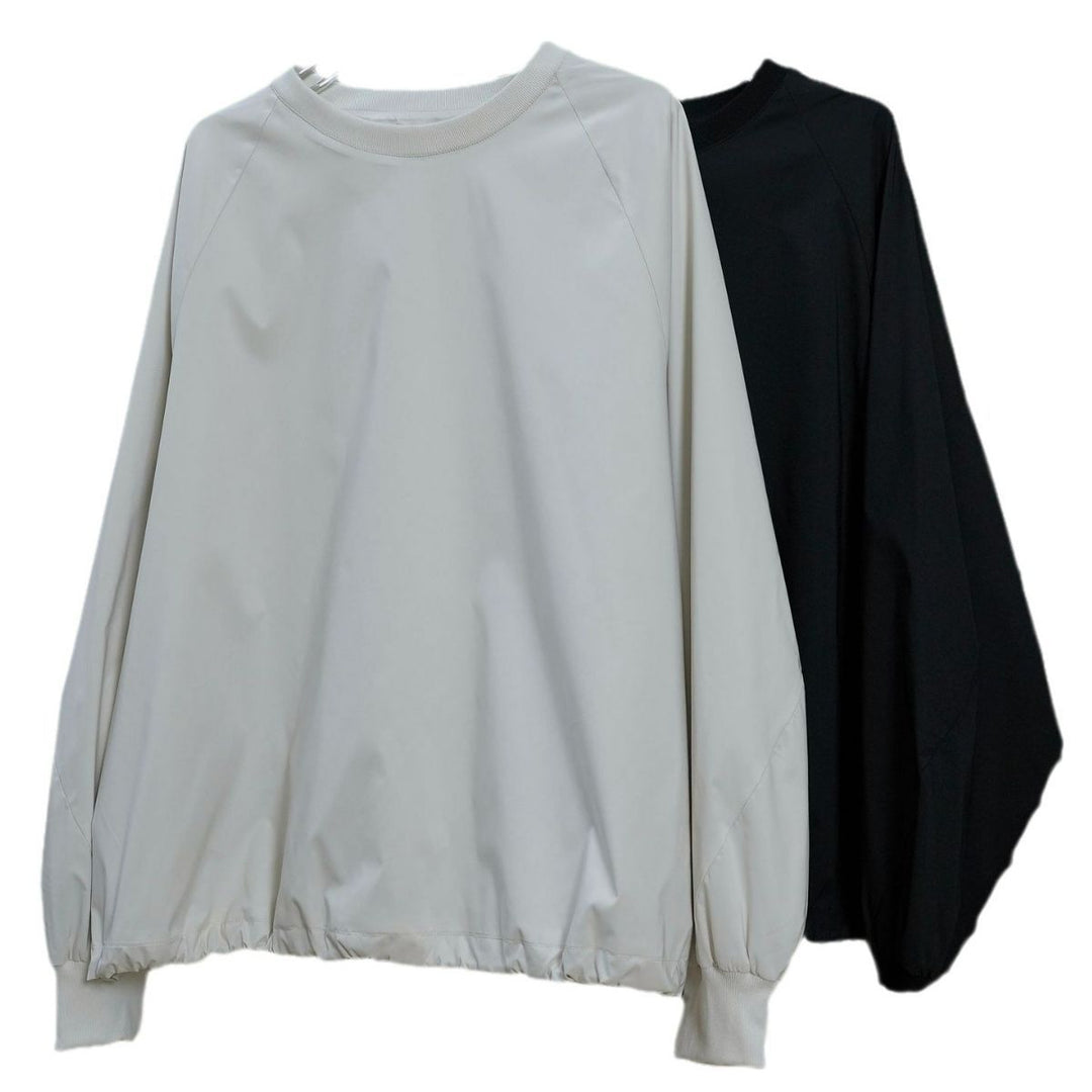 Women's Oversize Rain and Wind Pullover with Water-Repellent Surface and Elastic Hem Mune Fashion