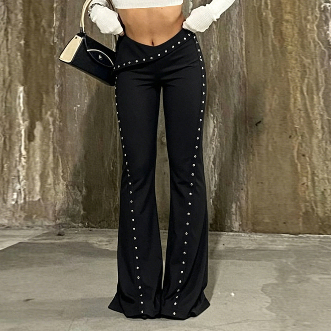 Women’s flared trousers with wrap waistband and decorative press stud placket Mune Fashion