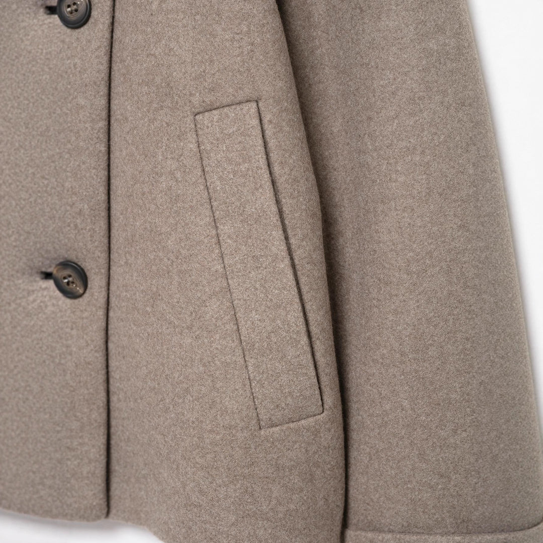 Women's short jacket in boxy cut made of wool blend with high stand-up collar and asymmetrical button placket Mune Fashion
