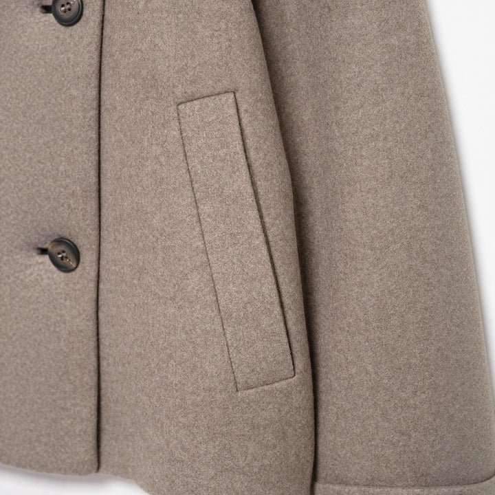 Women's short jacket in boxy cut made of wool blend with high stand-up collar and asymmetrical button placket Mune Fashion