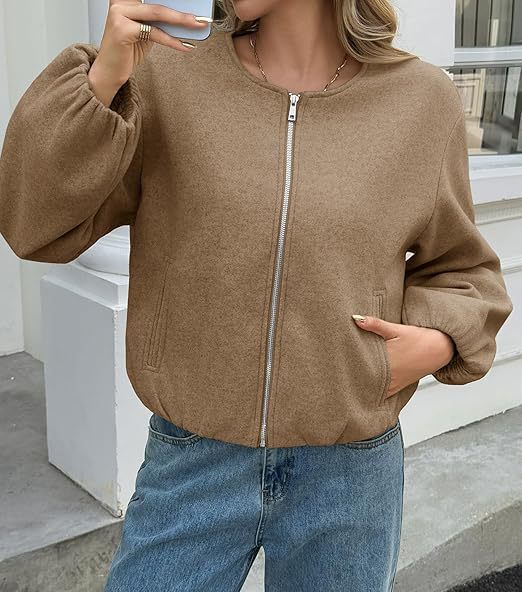 Women's short jacket with continuous zipper, balloon sleeves, and elastic hem Mune Fashion